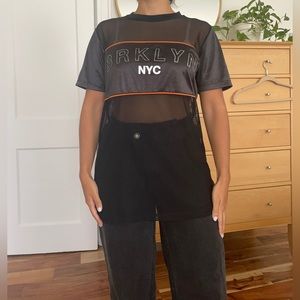 Oversized black sheet t-shirt. Brooklyn graphic detailing. Size small.